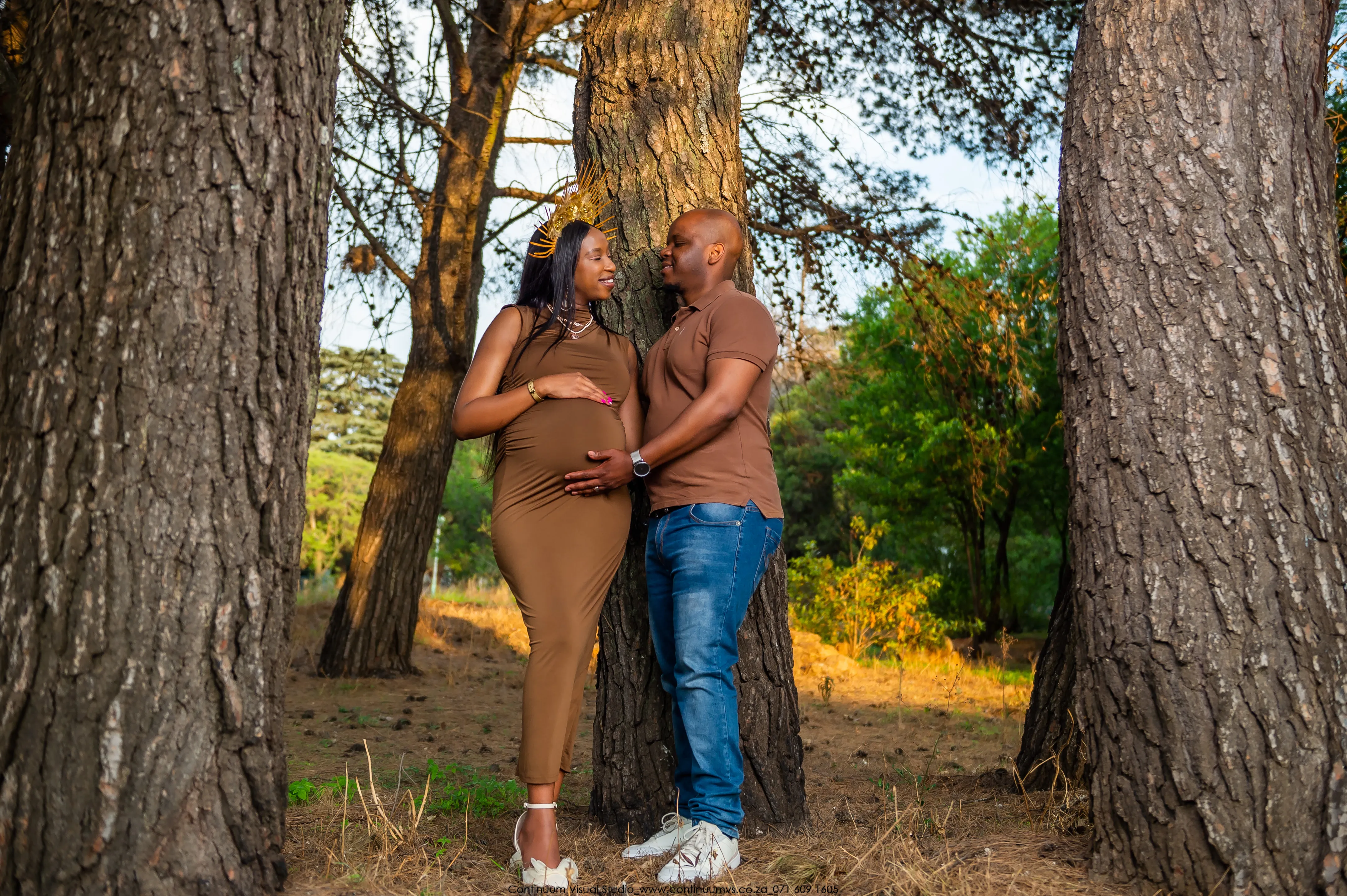 Maternity photography — studio portrait with draped fabric